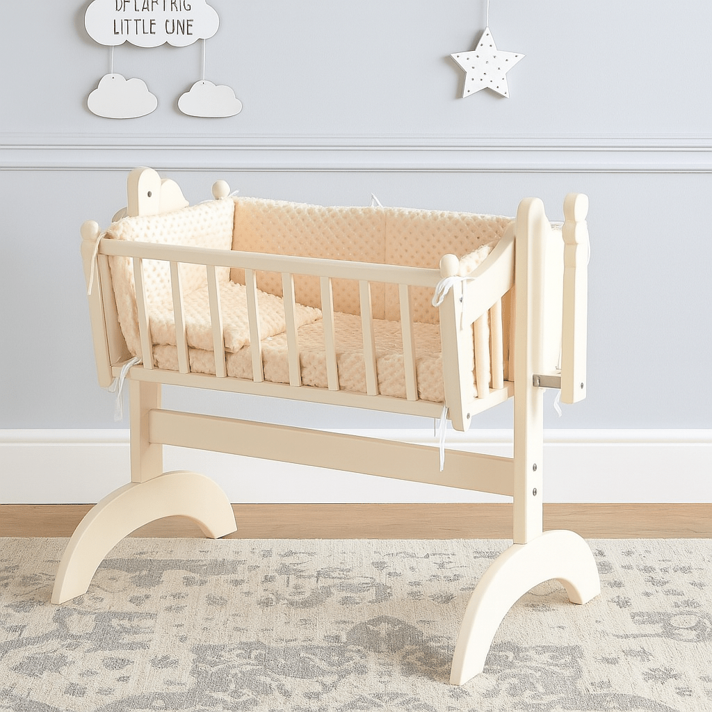 Wooden crib with beige bedding in a nursery setting