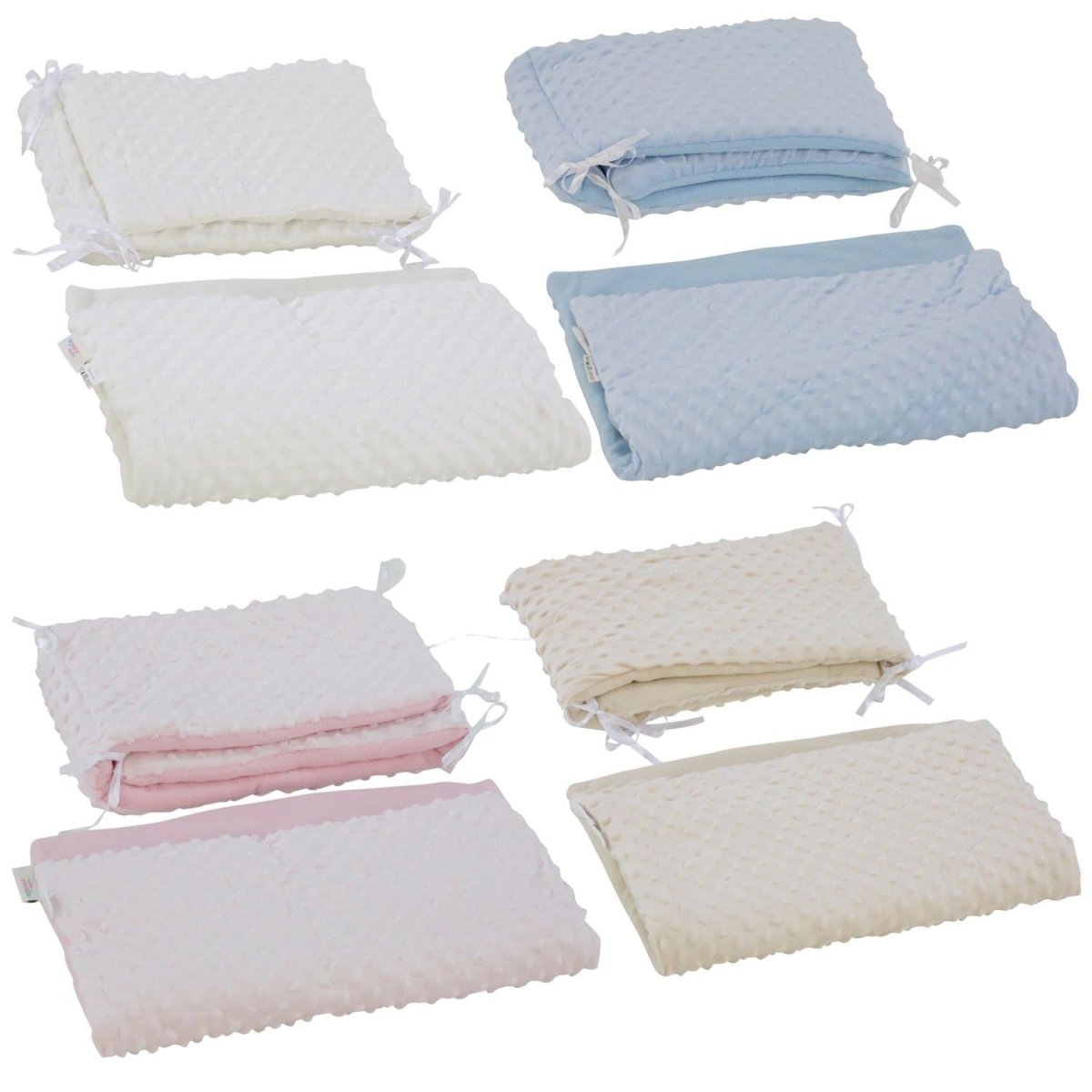 Set of folded baby blankets in white, blue, and pink on a white background