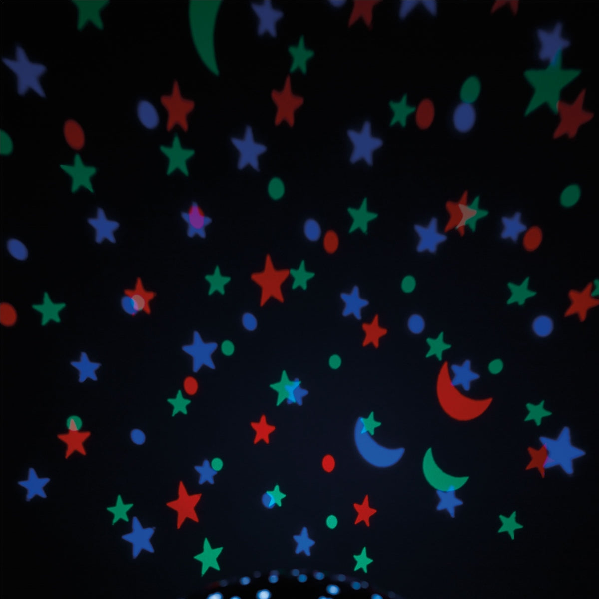 Colorful stars and moon shapes on a dark background