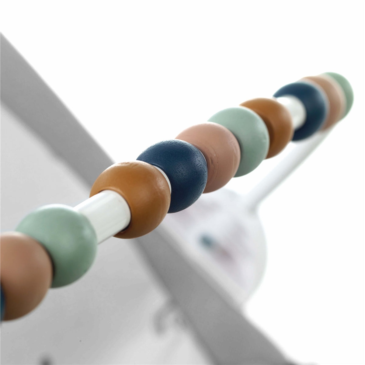Colorful abacus beads on a blurred background
