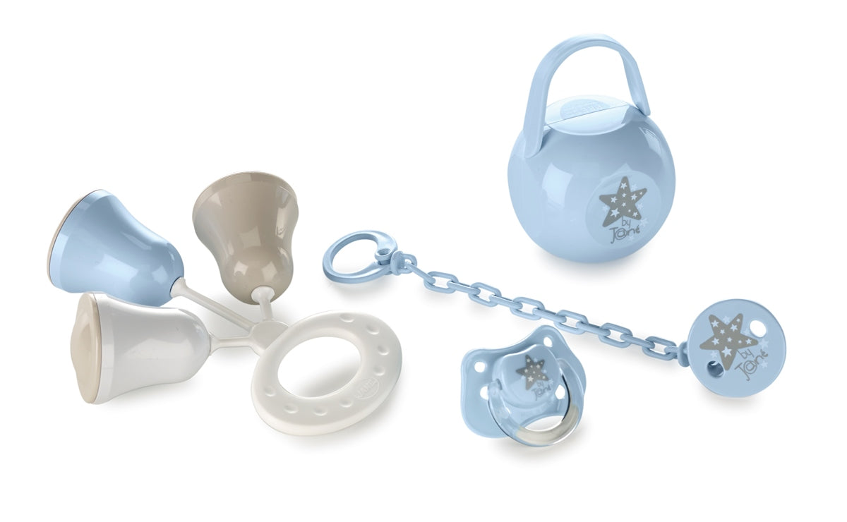 Baby toy set with pacifiers, rattle, and teether on a white background