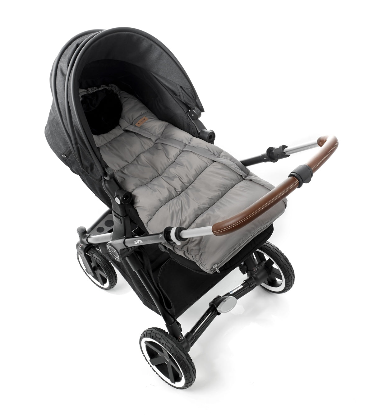 Gray stroller with a quilted cover on a white background