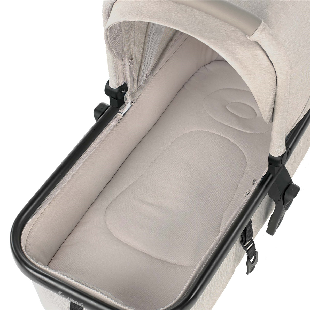 Close-up of a beige baby stroller bassinet with a white background