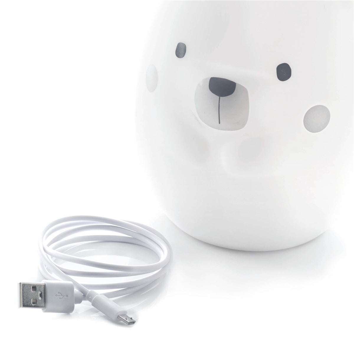 White bear-shaped night light with a USB cable on a white background
