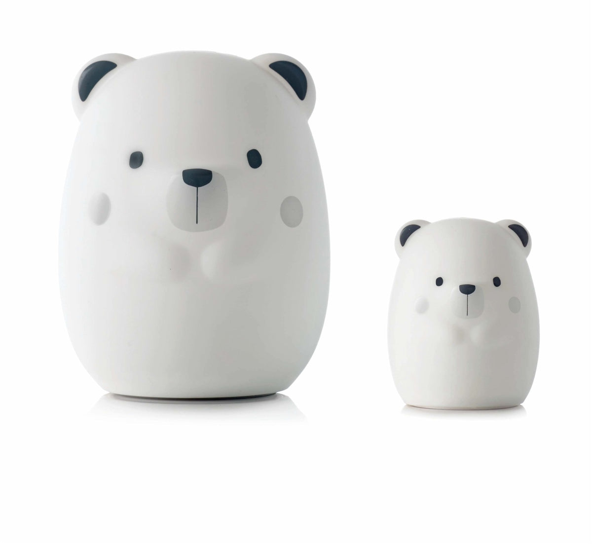 Two white bear-shaped night lights on a white background
