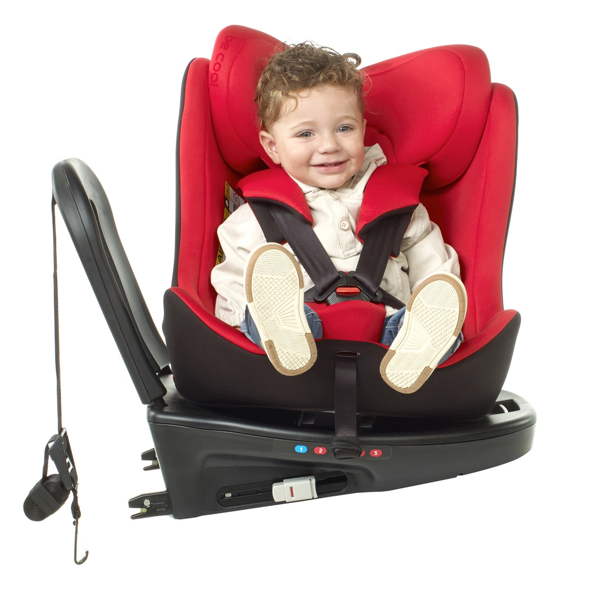 Child in a red car seat on a white background