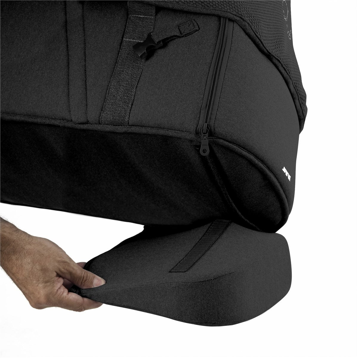 Black stroller with a person adjusting the backrest on a white background