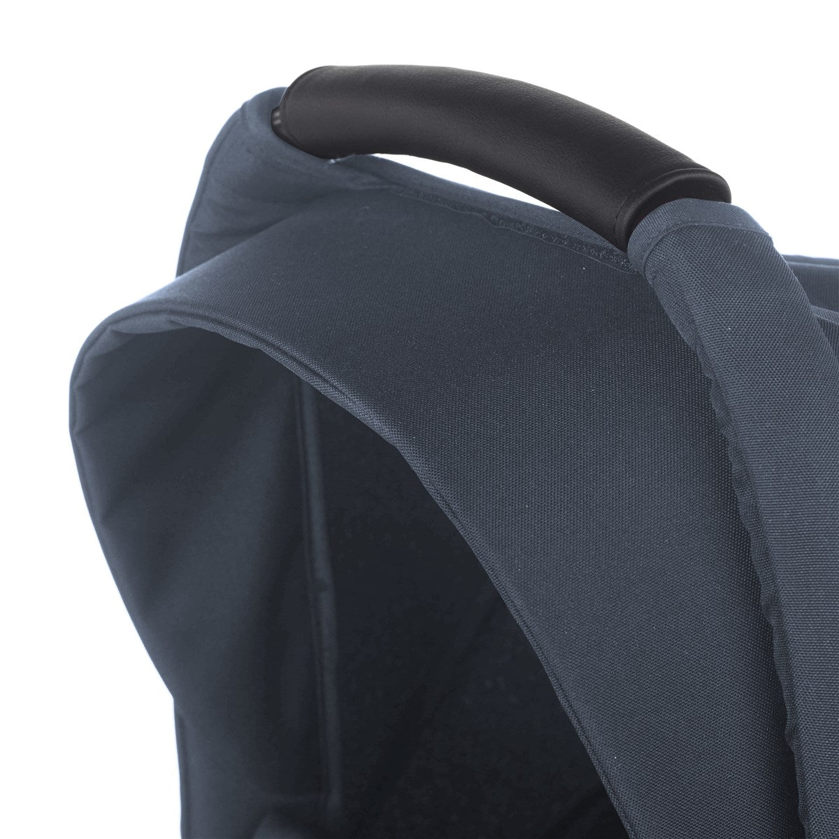 Close-up of a blue baby carrier with a black handle on a white background