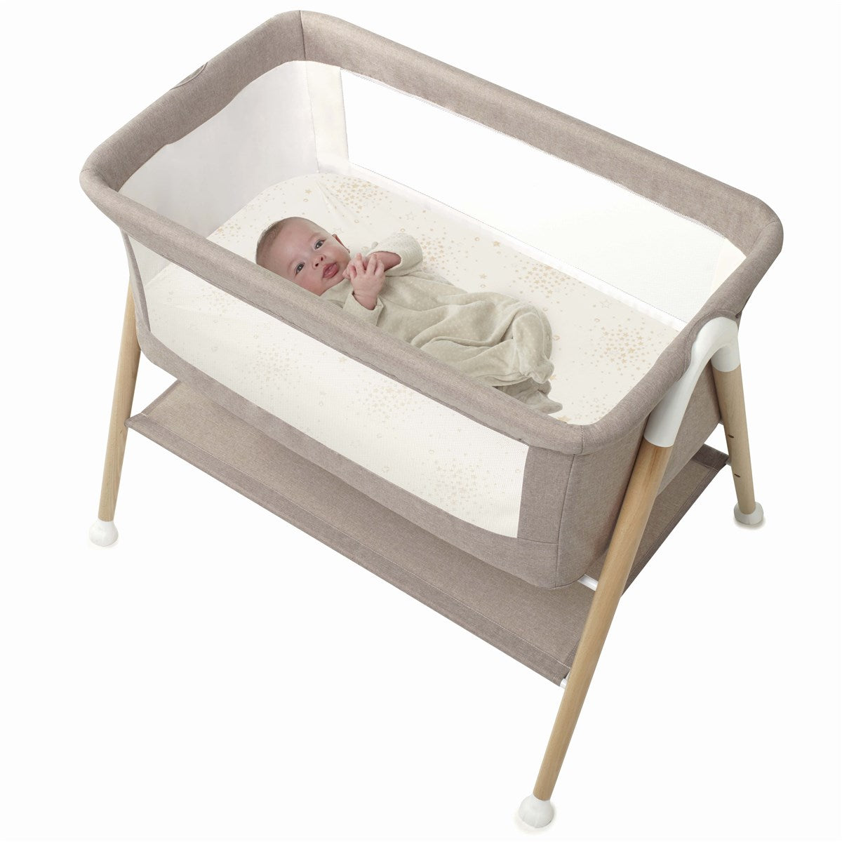 Portable baby crib with a baby inside on a white background