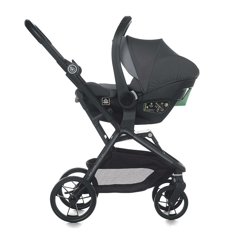 Black stroller with car seat attachment on a white background