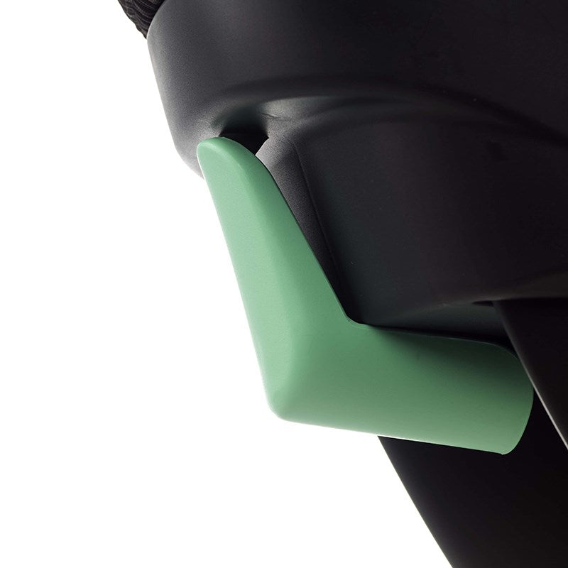 Close-up of a black and green product on a white background