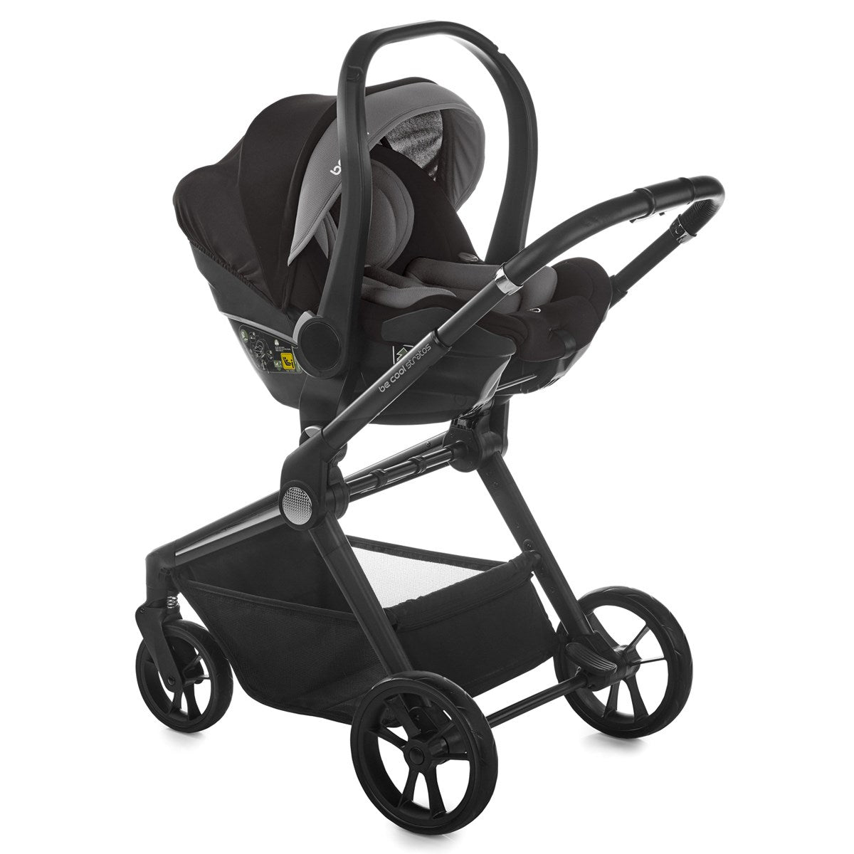 Black baby stroller with car seat on a white background