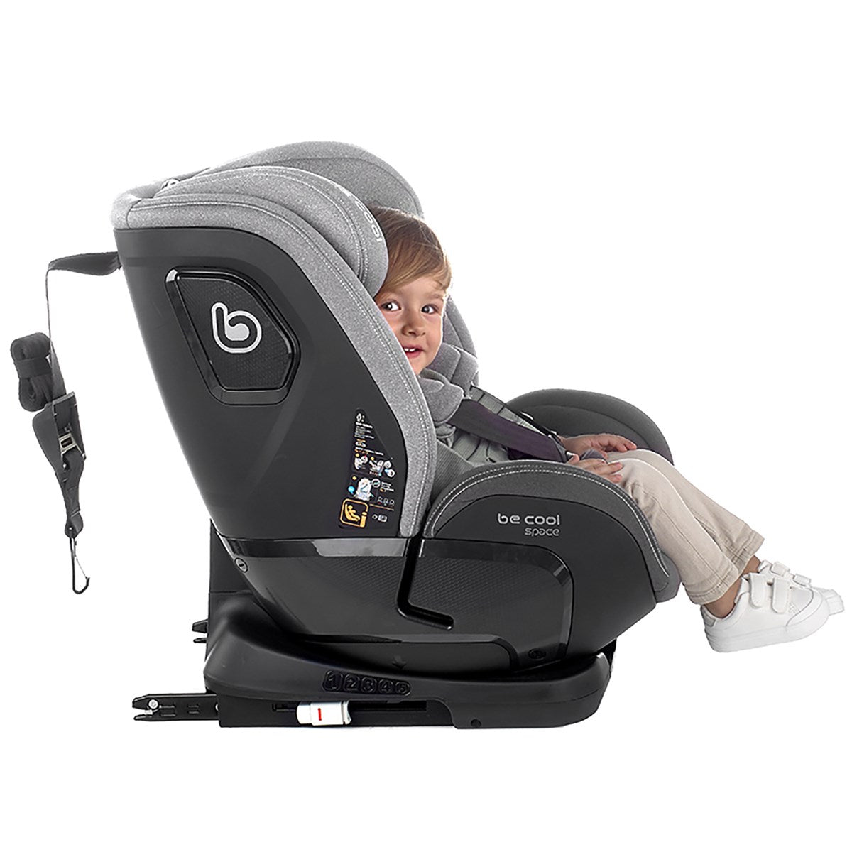 Child in a gray car seat with visible brand logo on a white background