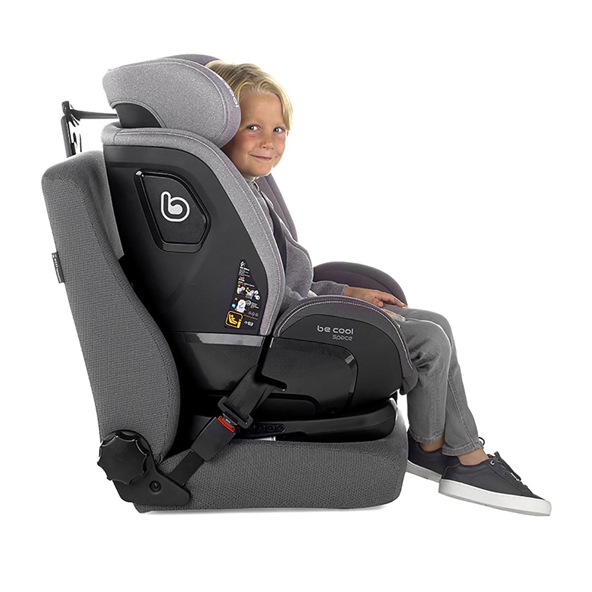 Child sitting in a gray car seat with a visible brand logo on a white background