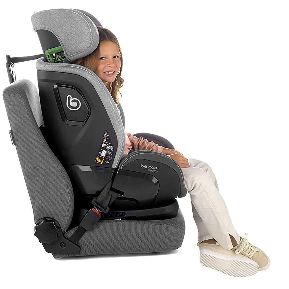 Child sitting in a gray car seat with a visible brand logo on a white background