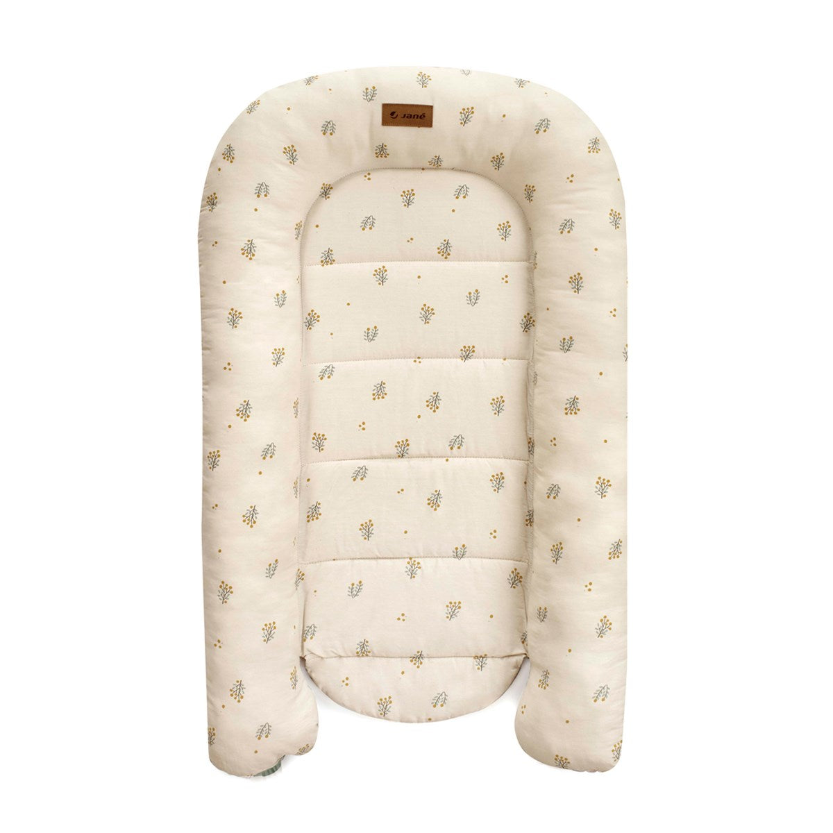 Cream-colored baby bed with subtle pattern on a white background