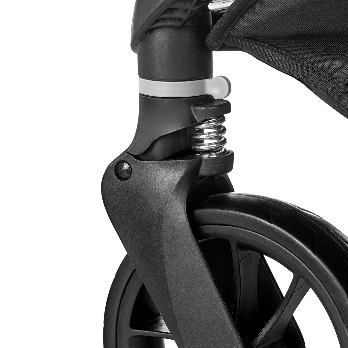 Close-up of a black stroller wheel with suspension mechanism on a white background