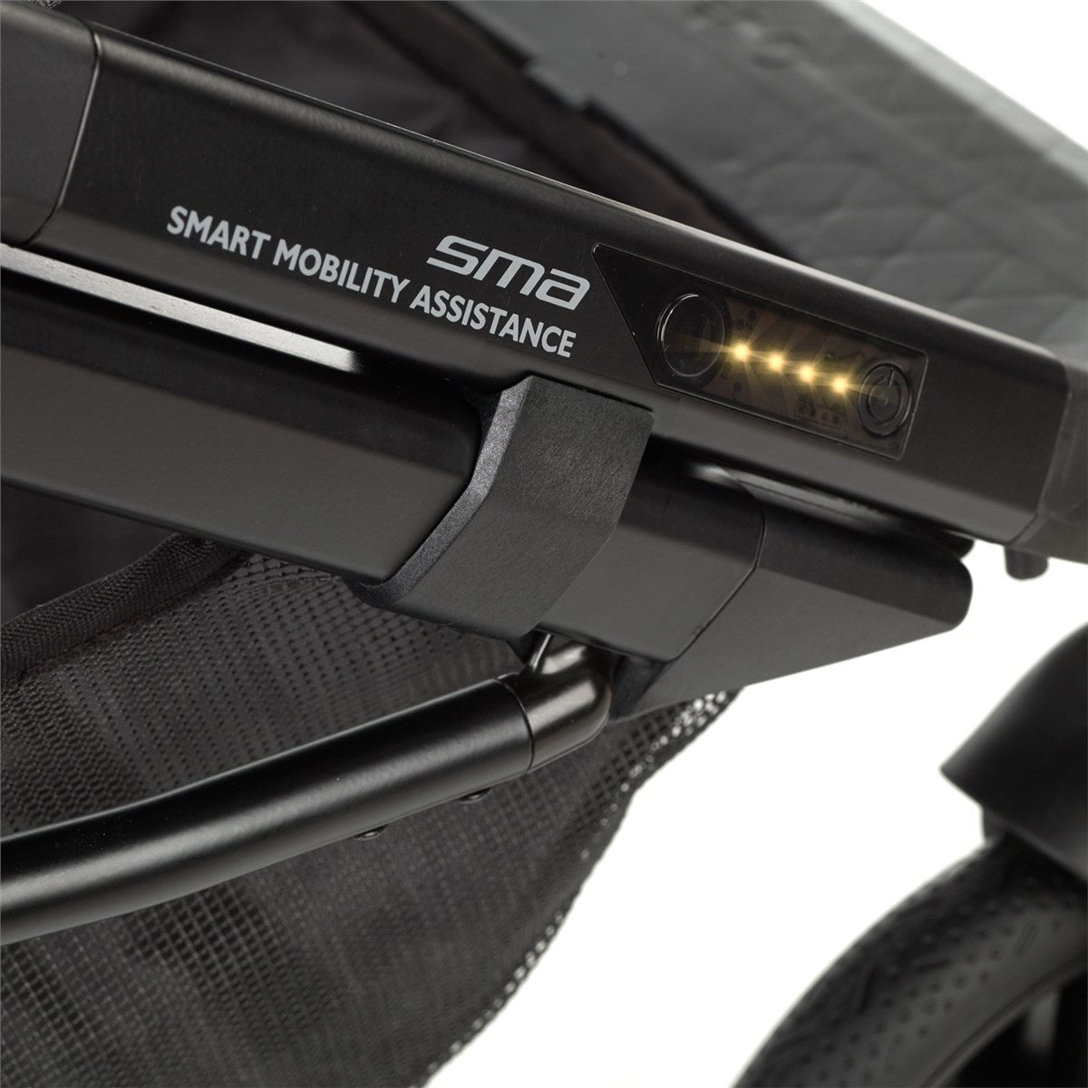 Close-up of a stroller with 'SMA Smart Mobility Assistance' on a white background