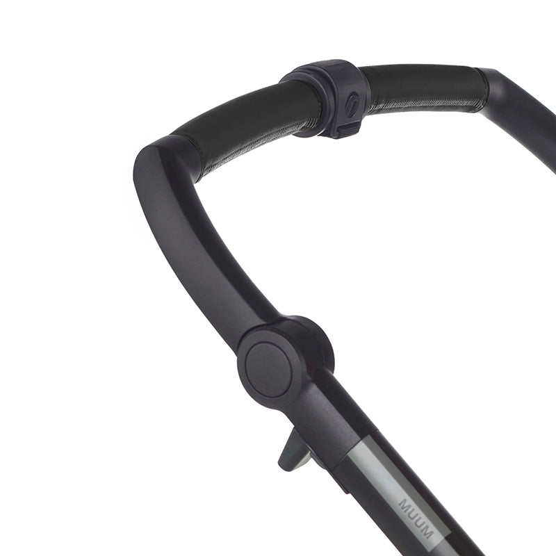 Close-up of a black stroller handlebar with 'Muum' branding on a white background