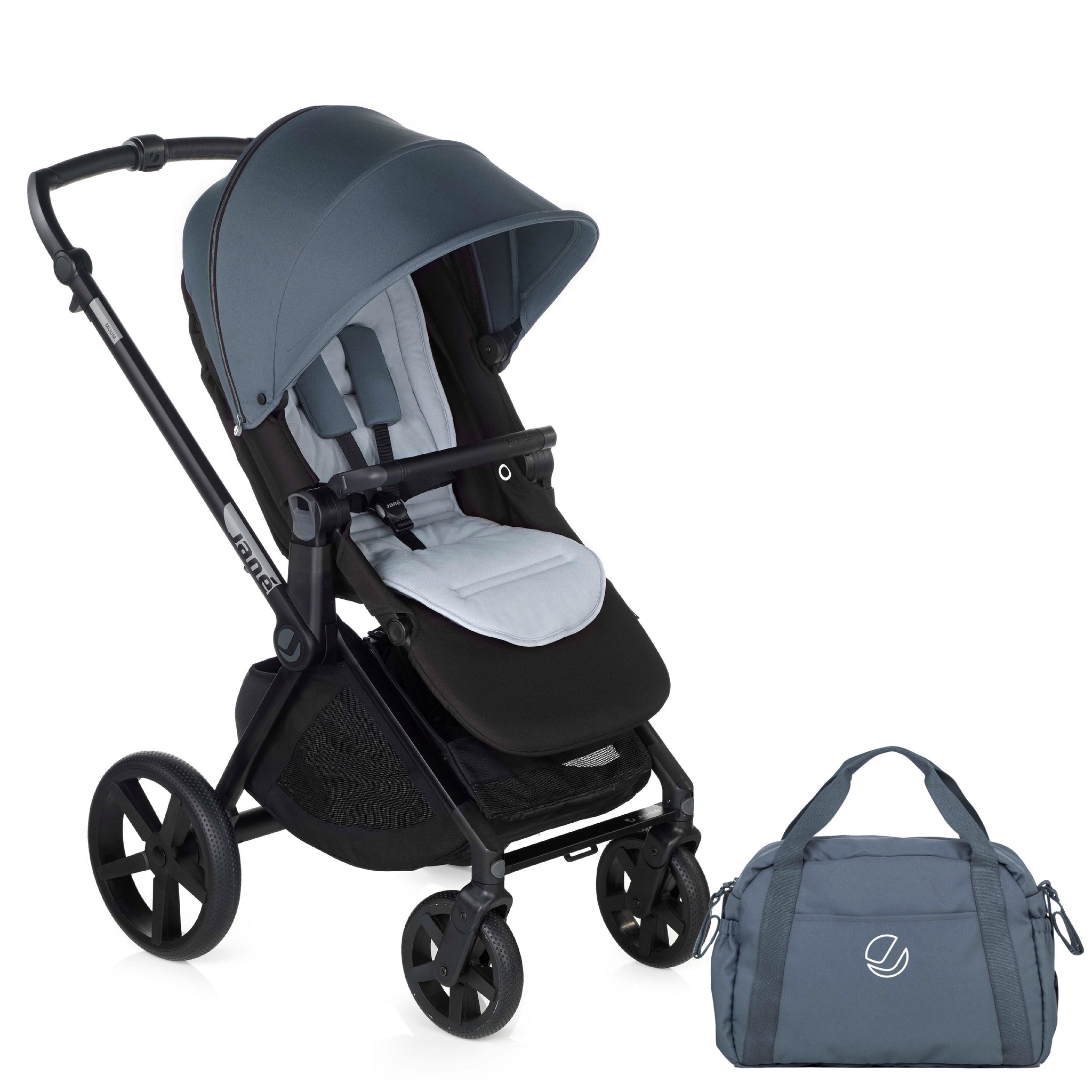 Baby stroller with dark blue canopy and matching diaper bag on a white background