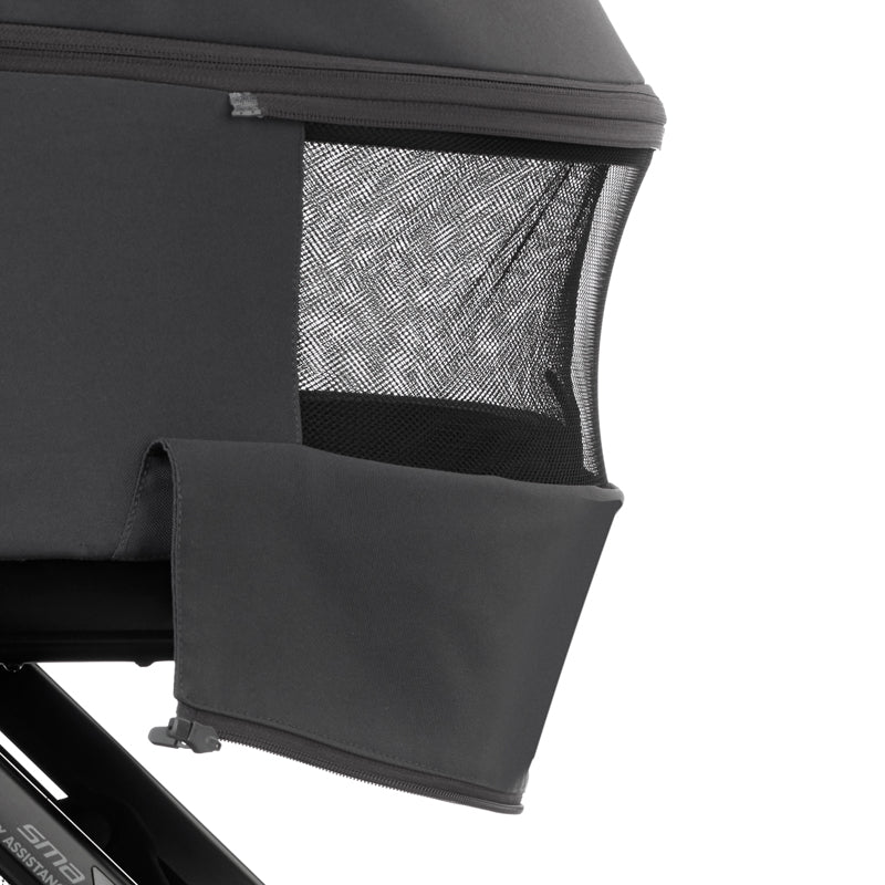 Black mesh screen on a vehicle window with a white background