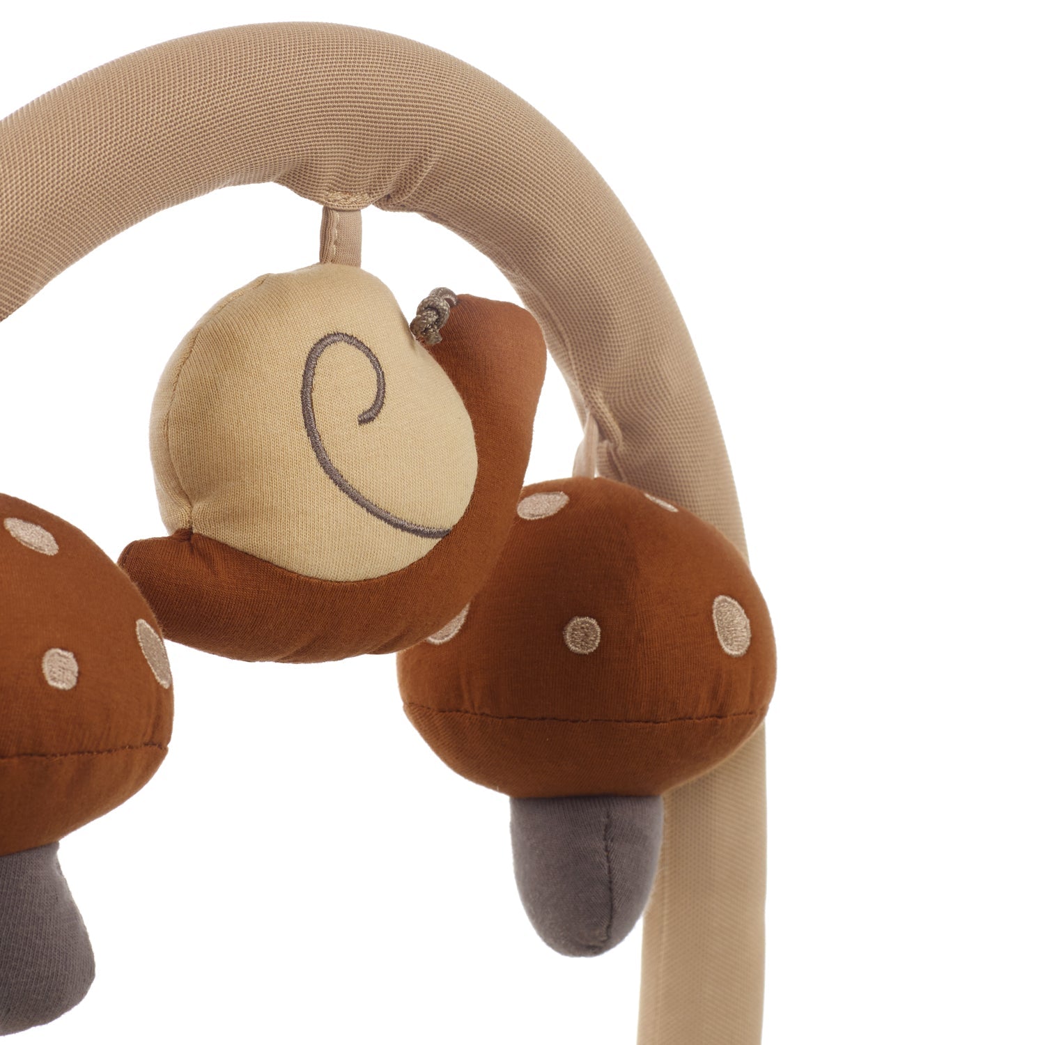 Children's toy with brown and beige elements on a white background