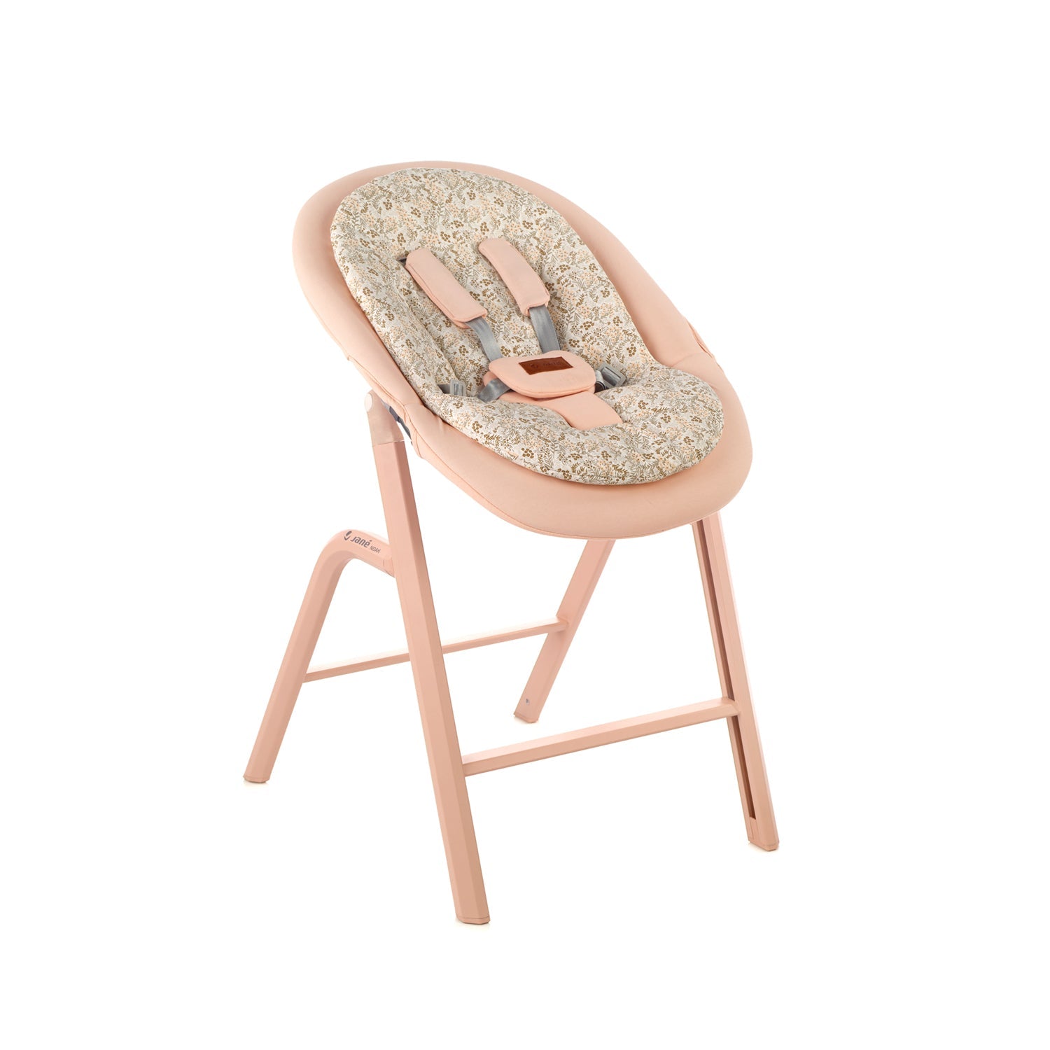 Baby high chair with floral cushion on a white background