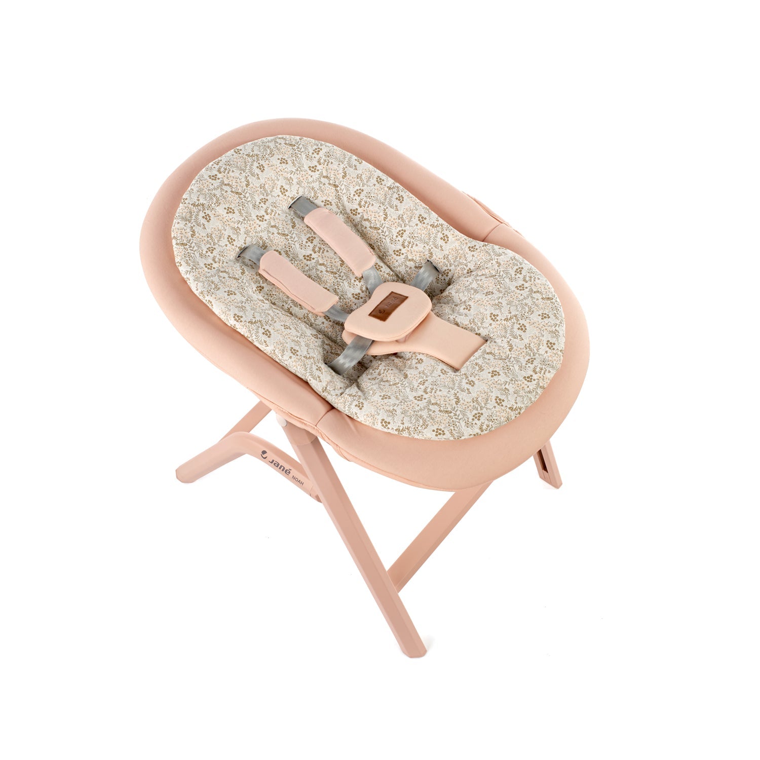 Baby chair with floral patterned cushion and pink stand on a white background