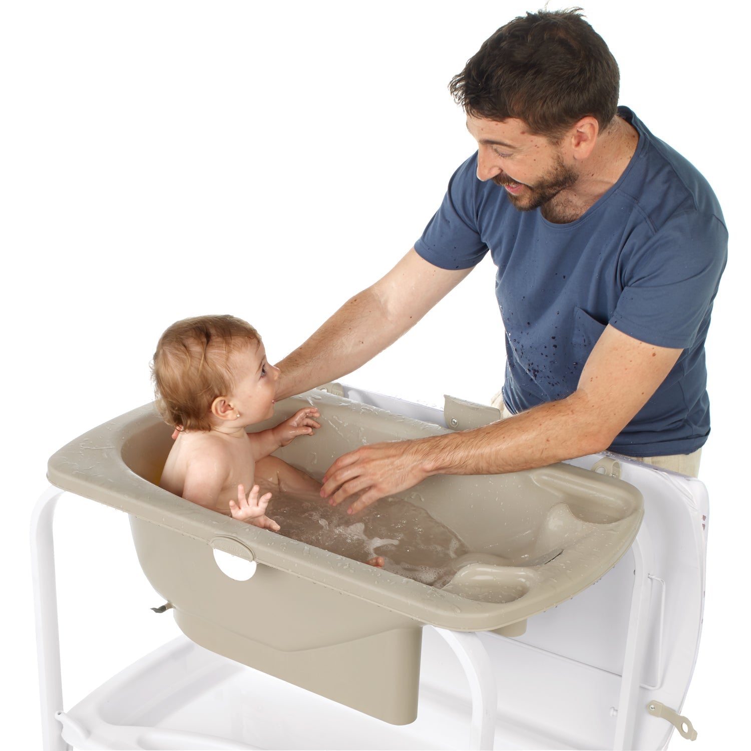 Man and baby using a baby bath seat on a white background