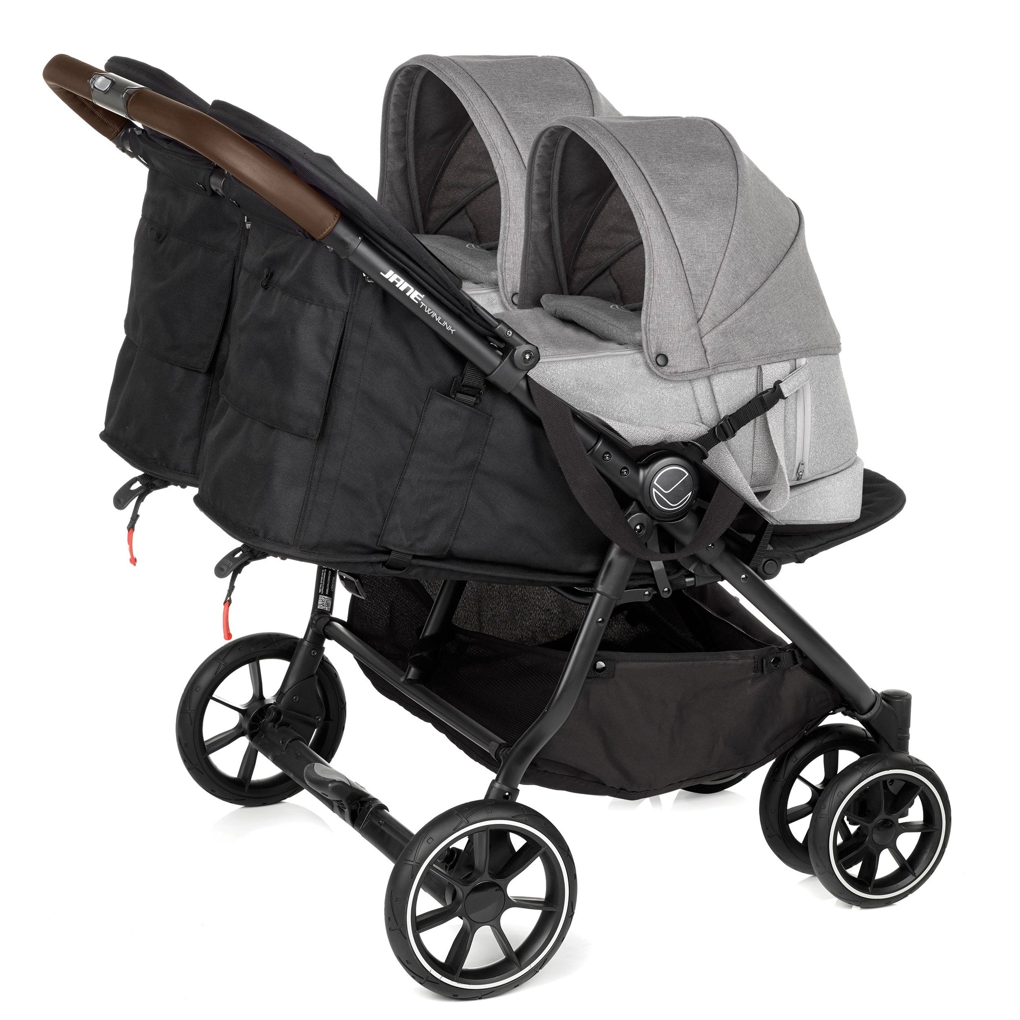 Black and gray double stroller on a white background