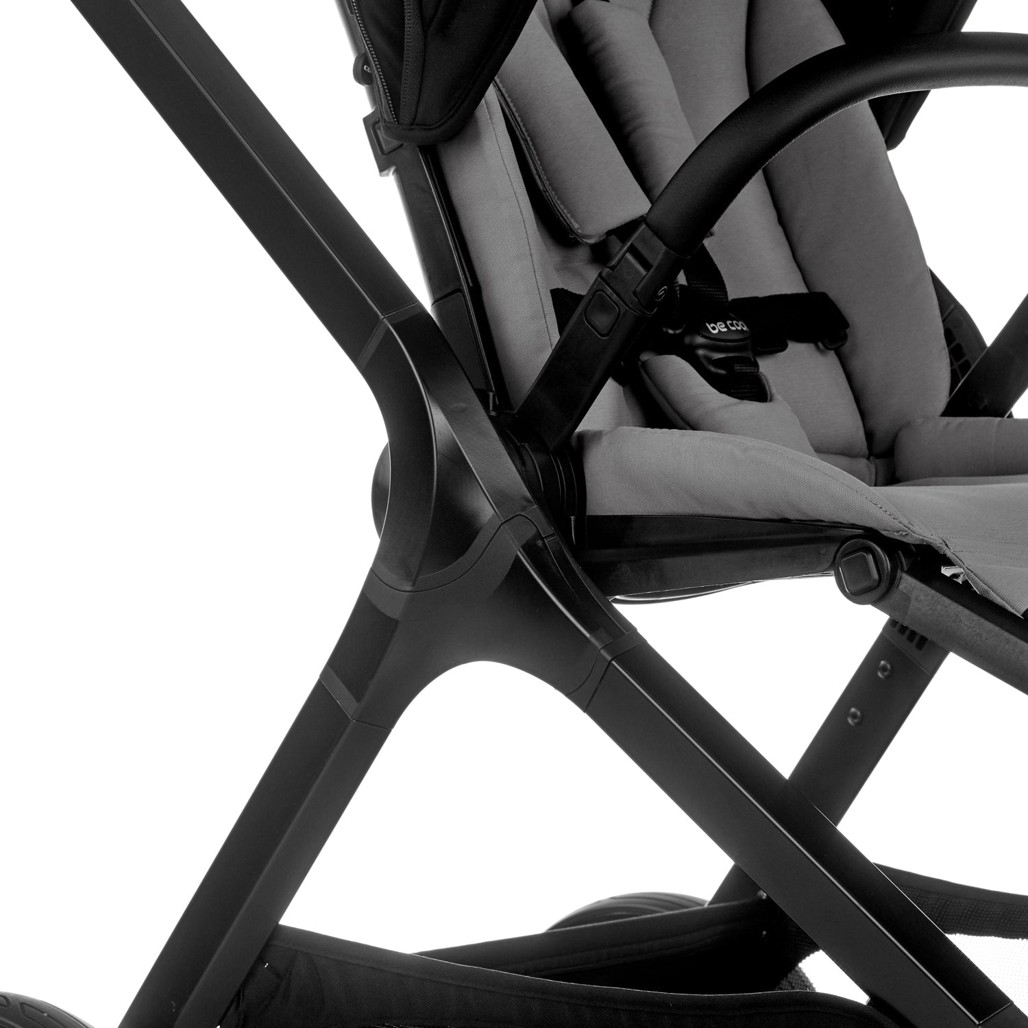 Close-up of a baby stroller with a white background