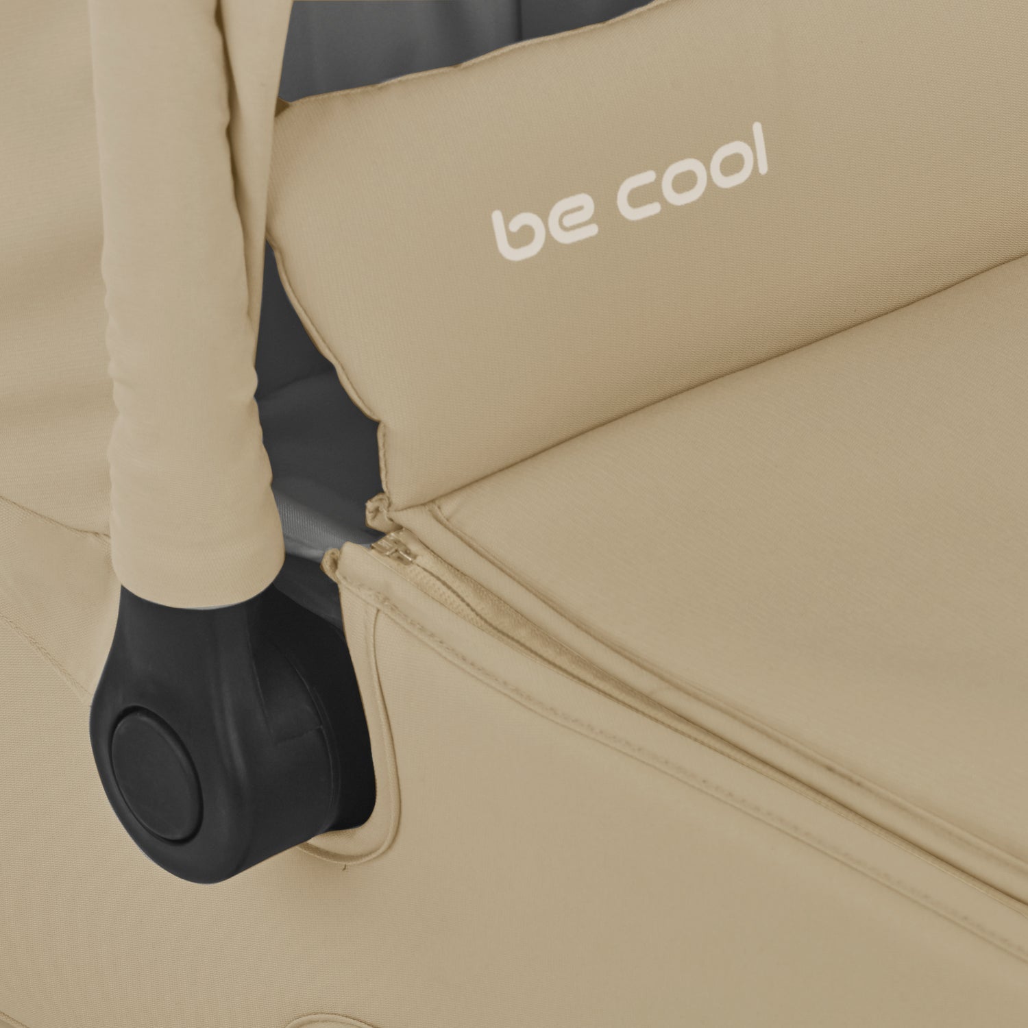 Beige child seat with 'be cool' text on a dark background