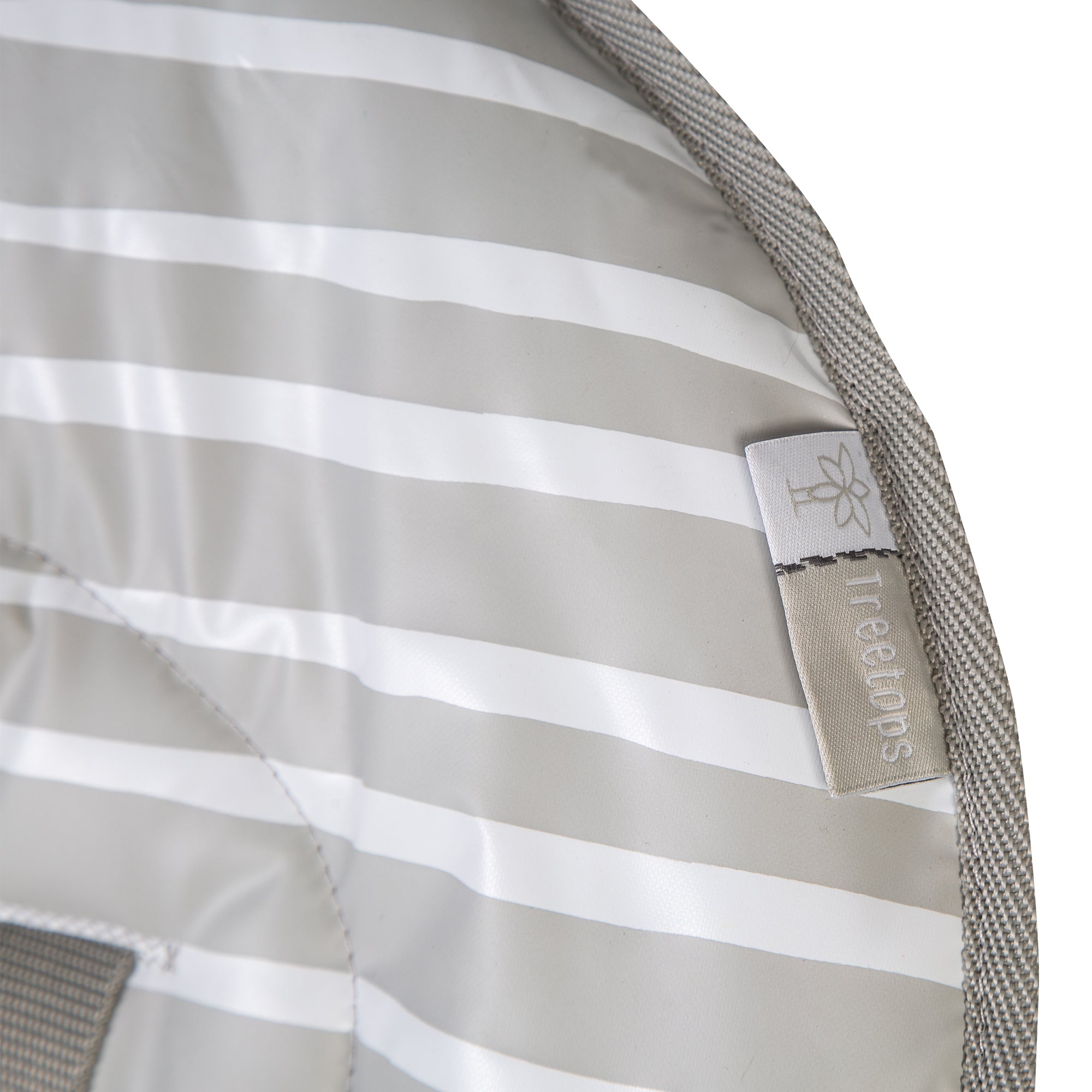 Close-up of a grey and white striped fabric with a brand label on a white background