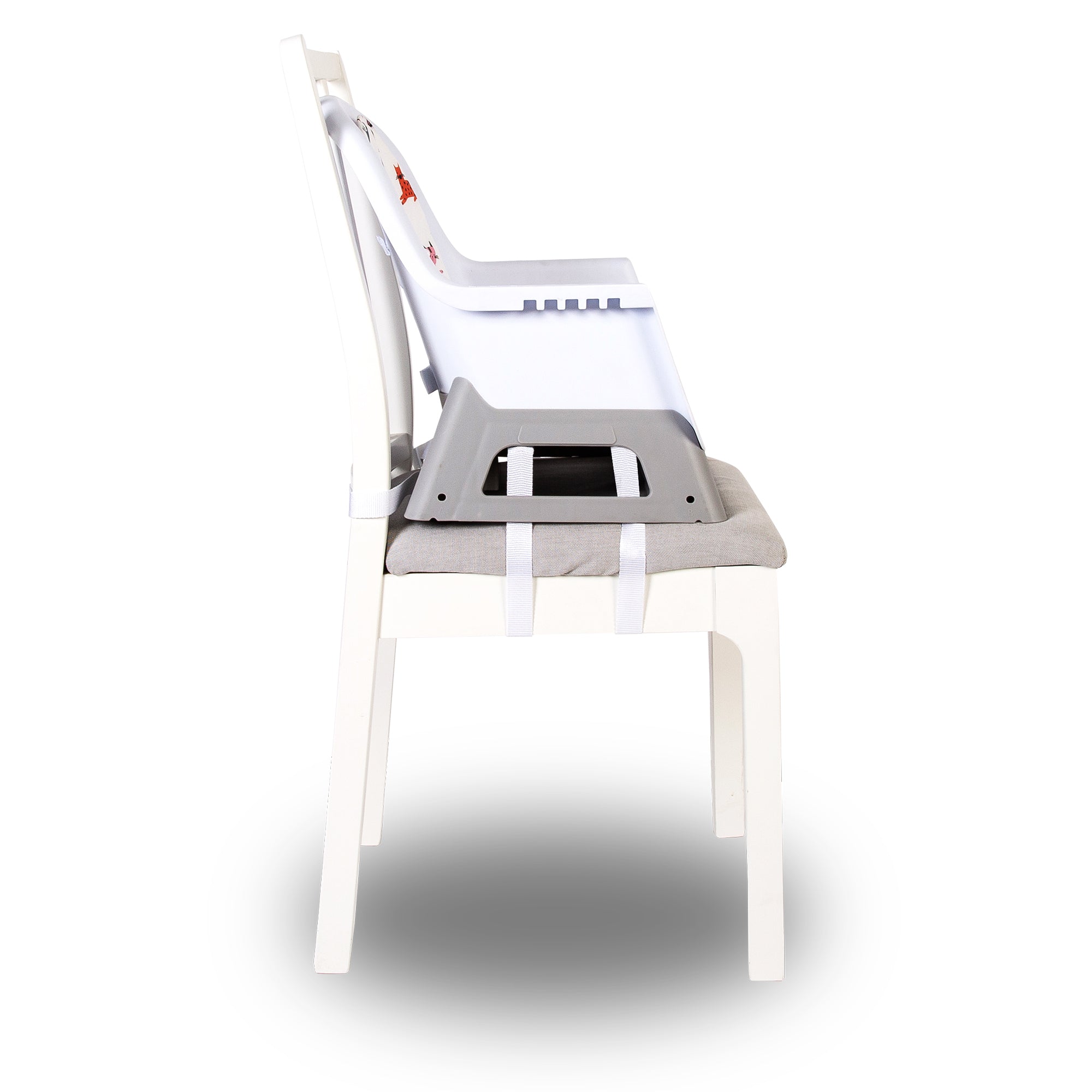 Baby high chair with safety straps on a white background
