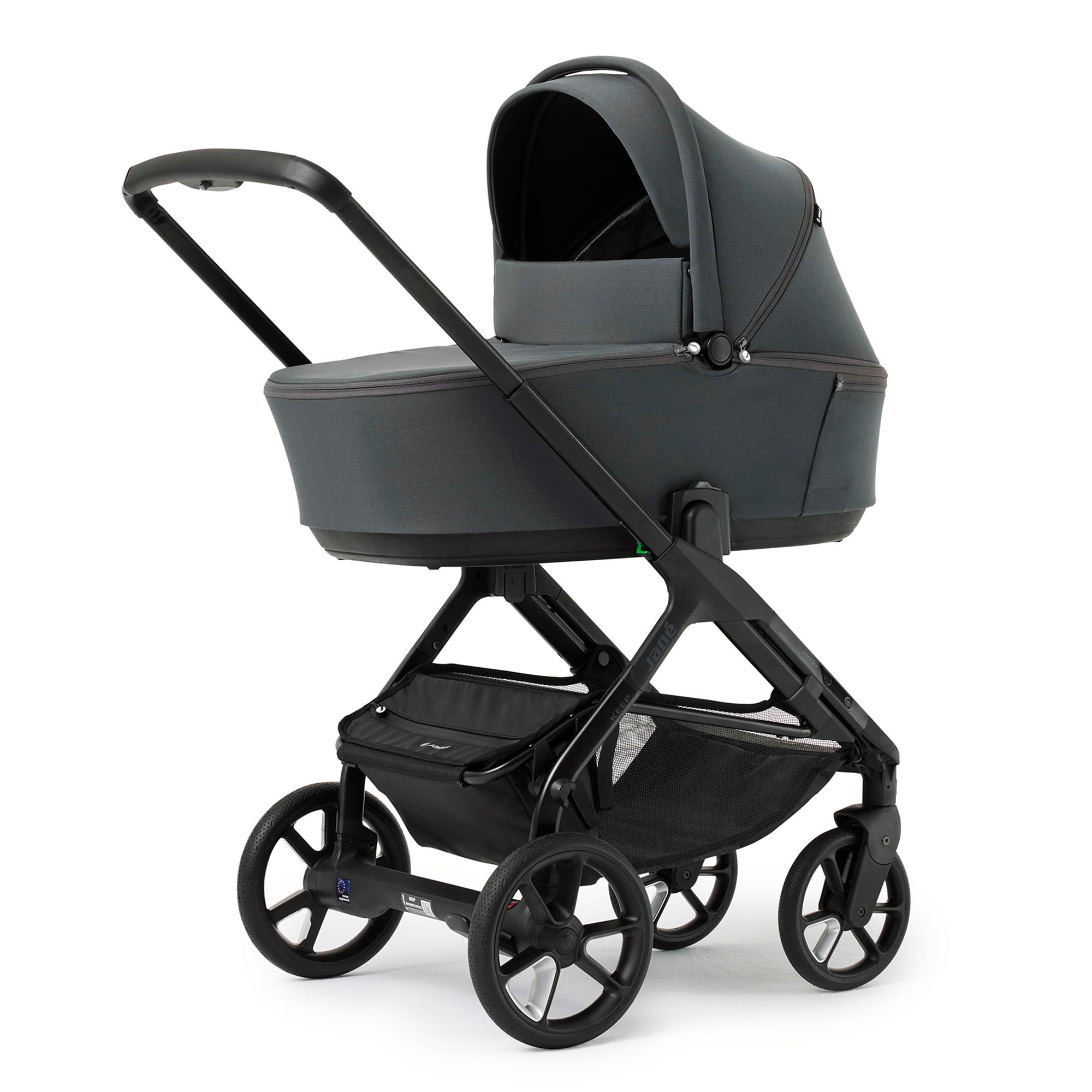 Black baby stroller with canopy on a white background