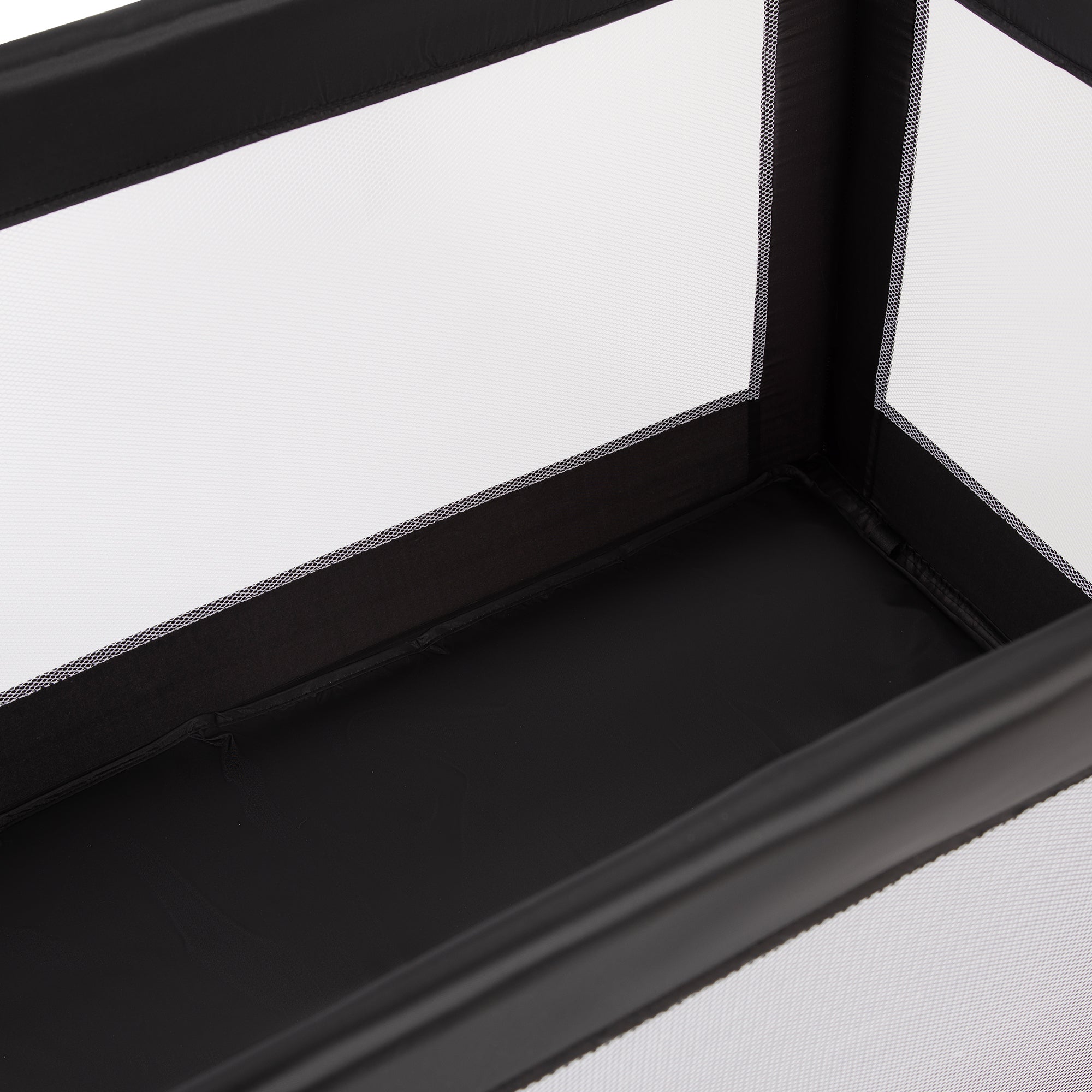 Close-up of a black rectangular object with a white background