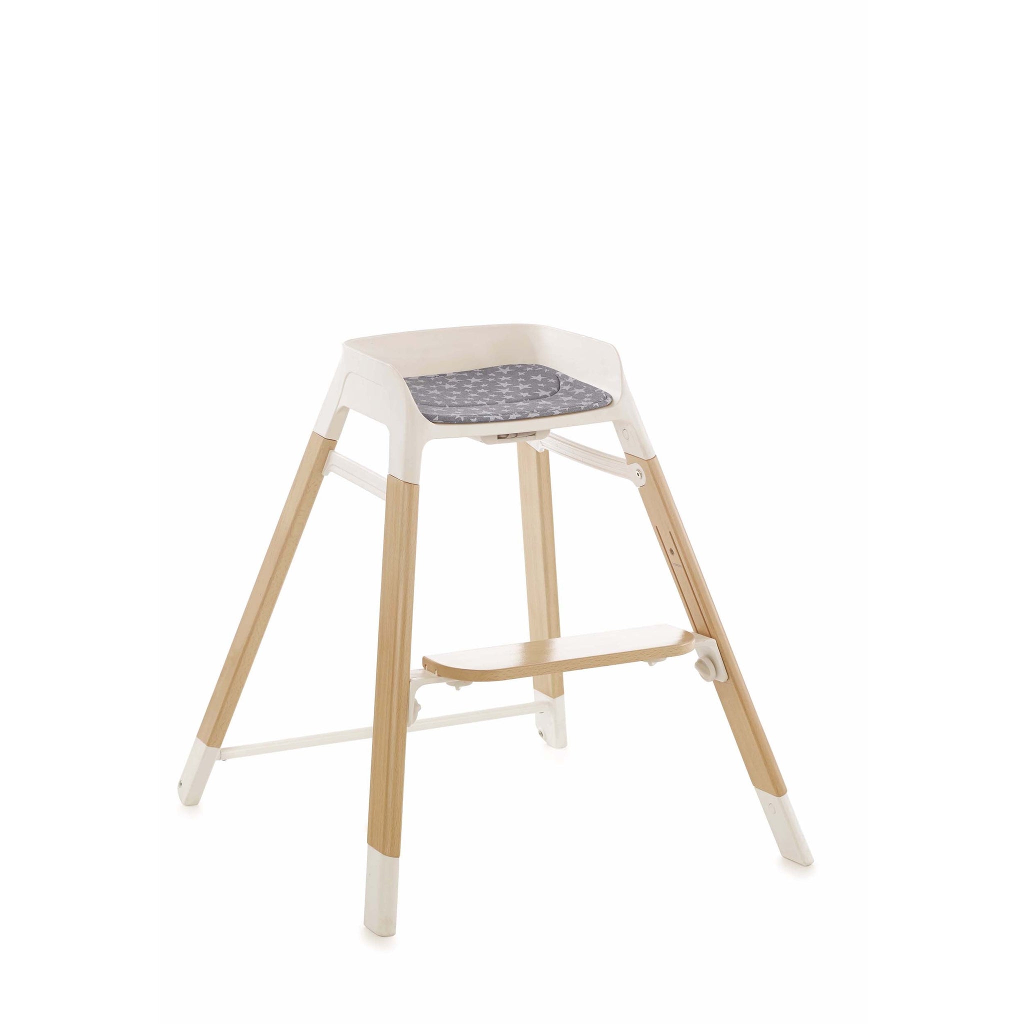 Bar stool with wooden legs and a white seat on a white background