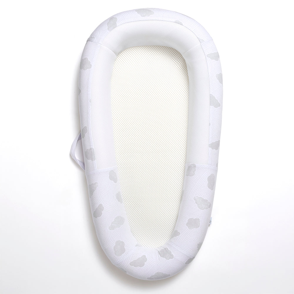 White baby bed with soft texture on a white background