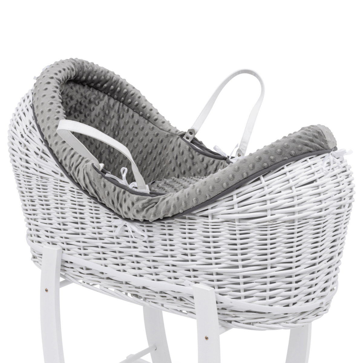 White wicker baby Moses basket with gray cushion on a white background