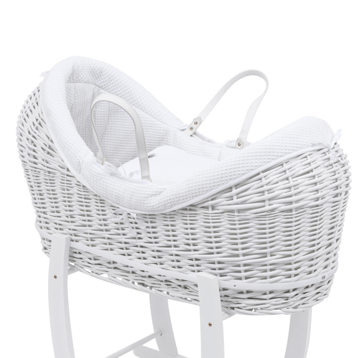 White wicker baby Moses basket on a white background